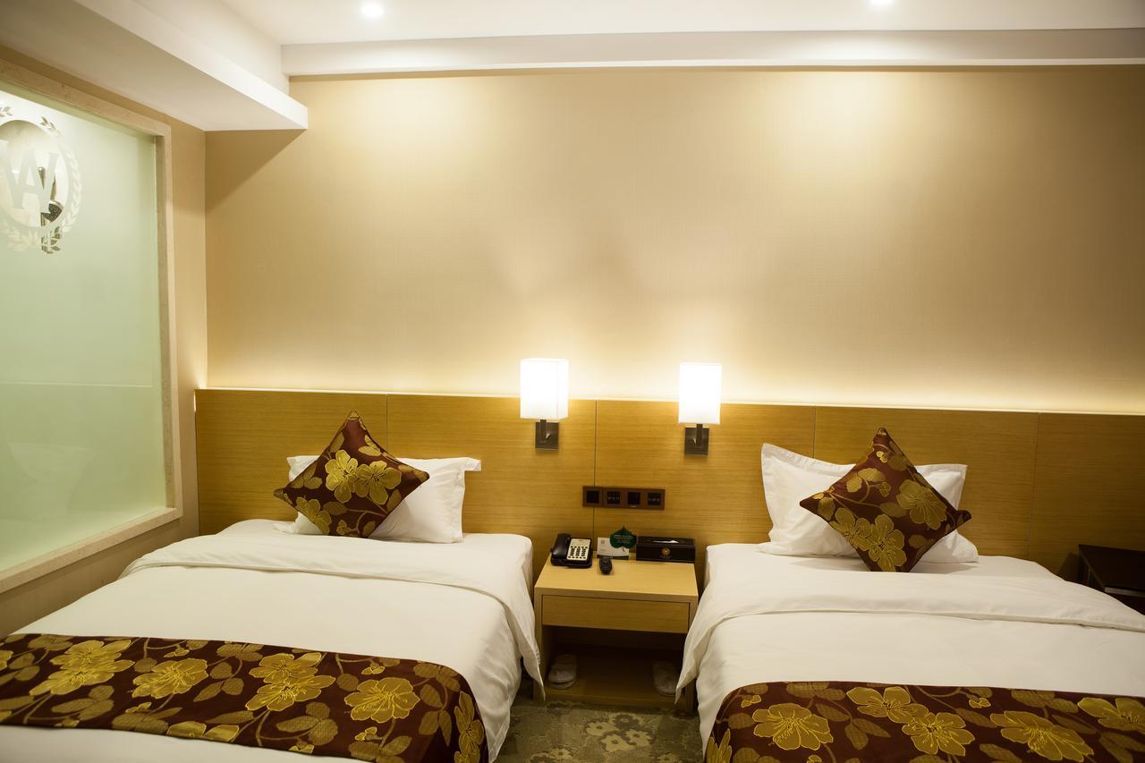 Guangzhou Wan Ao Hotel Plaza Limited Airport Express Hotel Room photo